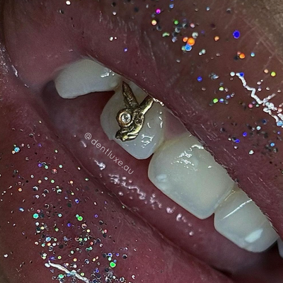 18k gold playboy diamond tooth gem